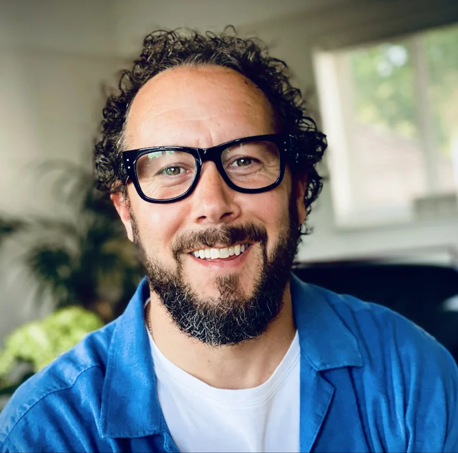 Marc Richards, the person behind Glade Tech, wearing a hand-drawn crown